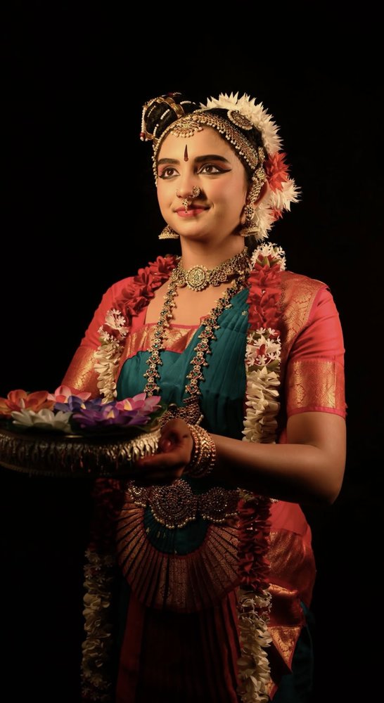 Bharatanatyam dancer with traditional makeup and jewelry