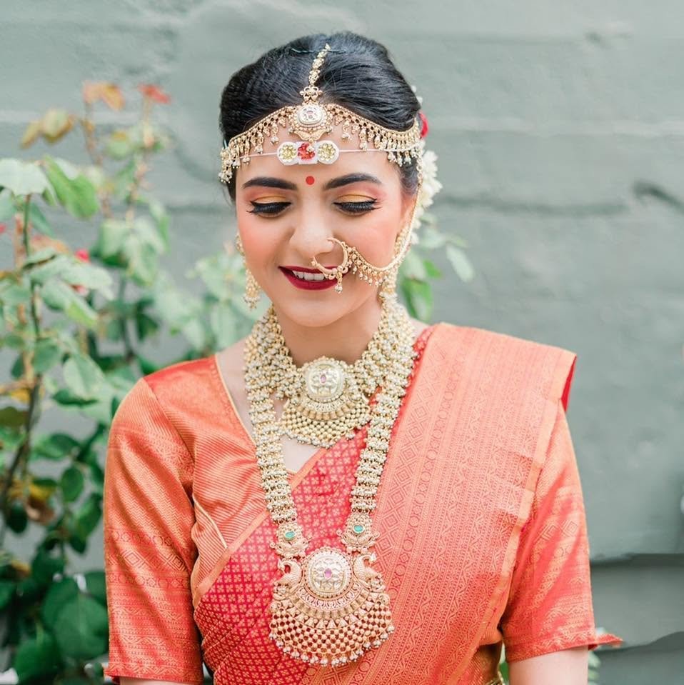 Traditional bridal makeup with matha patti
